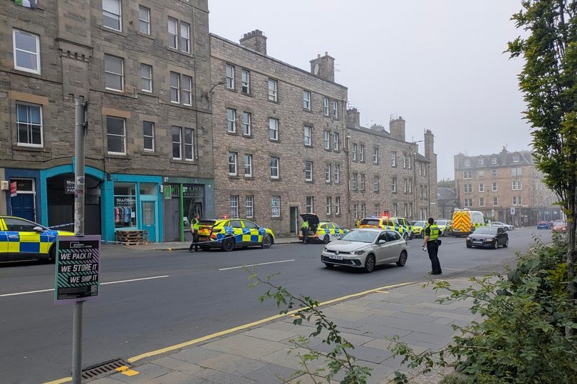 Edinburgh locals 'forced' to stay inside as 'riot police' lock down building