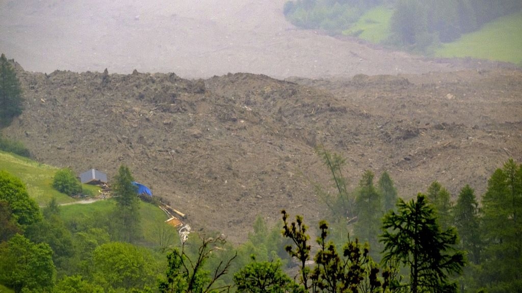 Massive glacier landslide devastates Swiss village, missing person search continues