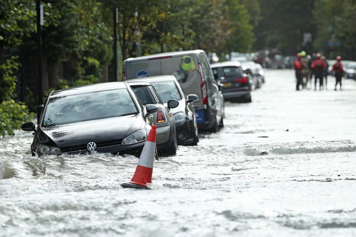 Dozens of residents evacuated after burst water main floods north London streets