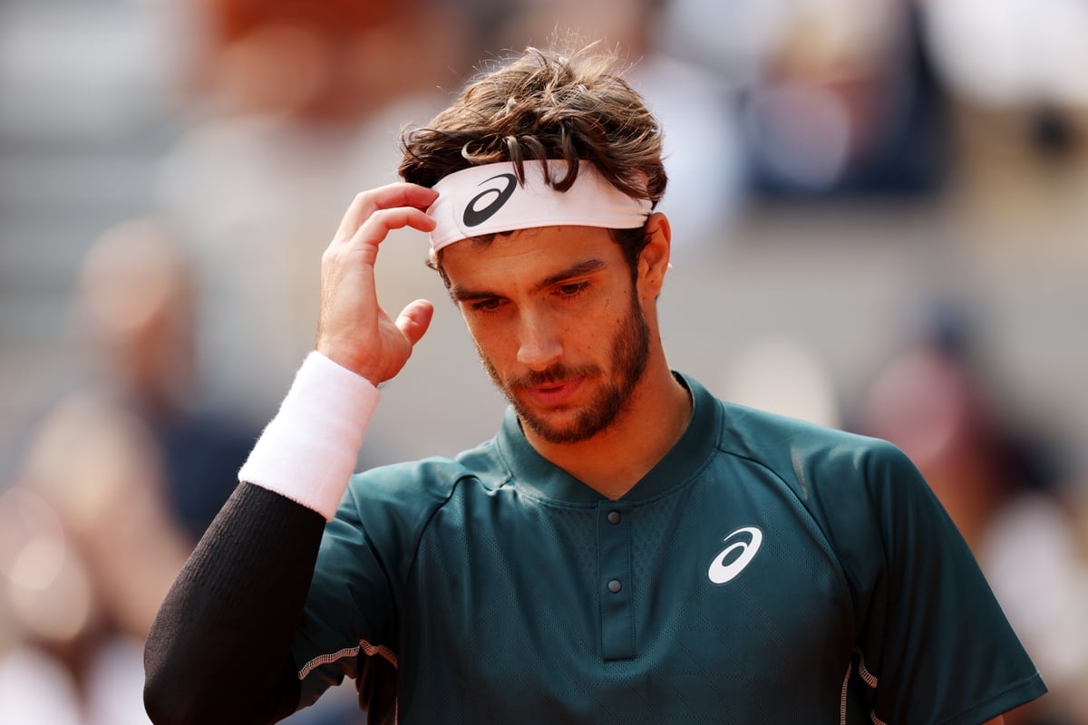 Lorenzo Musetti avoids French Open disqualification after kicking ball at line judge