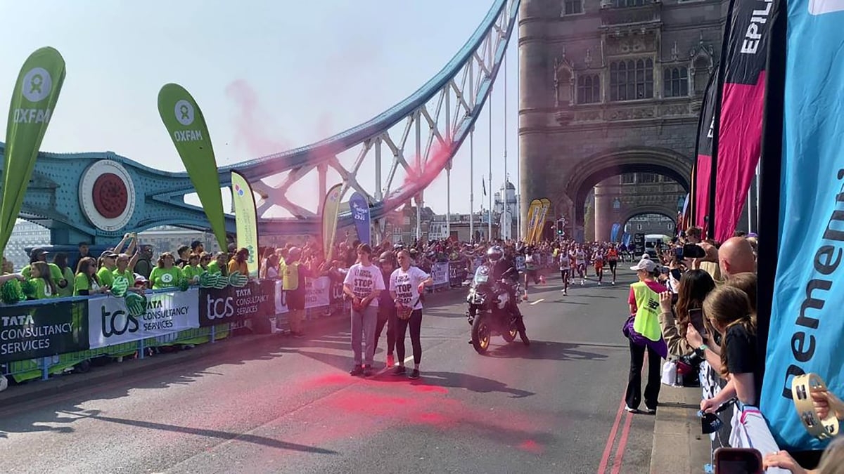 Chaos at London Marathon as protesters deface Tower Bridge with red paint