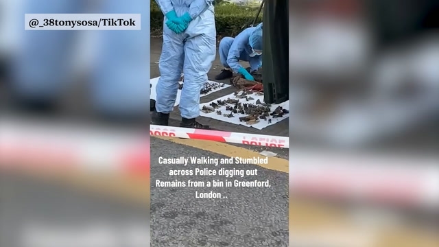 Shocking footage shows forensic officers digging out bones from bin in west London
