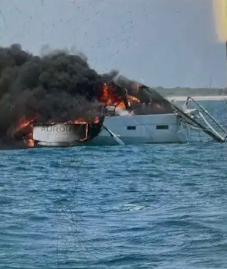 Four rescued from burning boat off Cape Canaveral