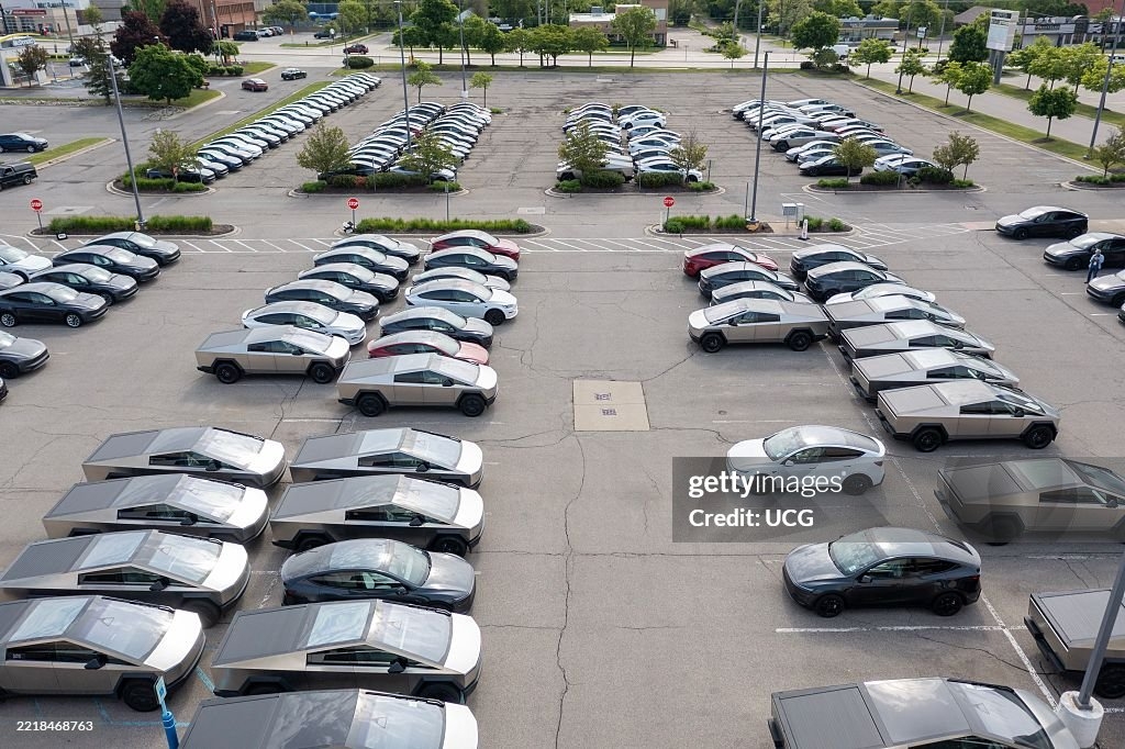 Tesla Cybertrucks are piling up in a disused parking lot in Michigan as the company deals with a stockpile of unsold vehicles