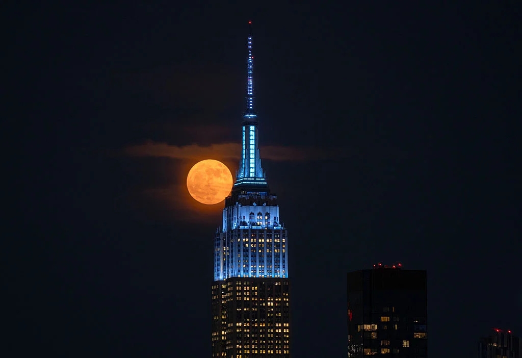 Photos: Strawberry Moon wows across the world