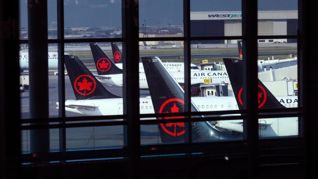 Air Canada flight attendants strike over pay, grounding service