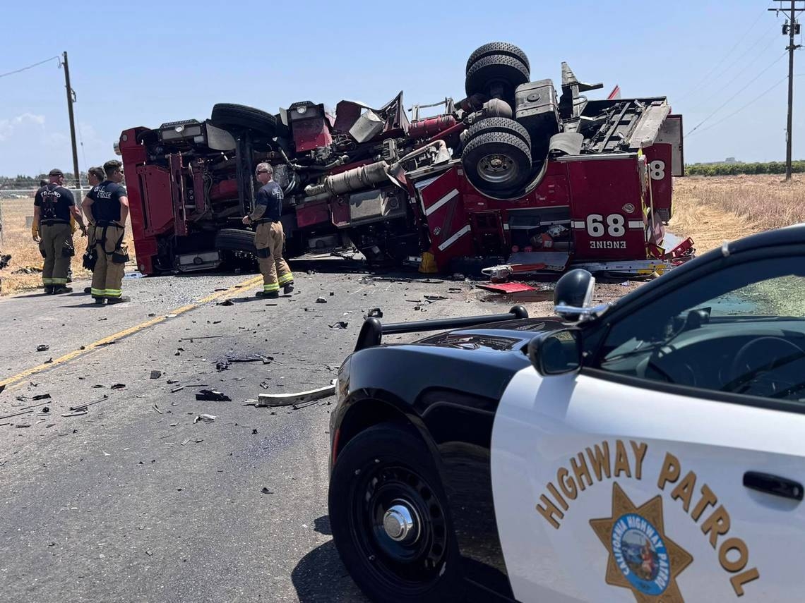 Fresno County Fire truck responding to a call involved in rollover crash with truck