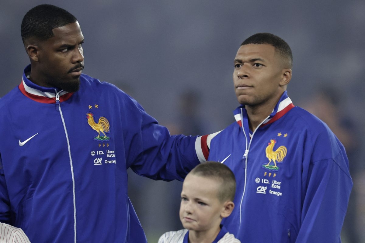 France teammates Kylian Mbappé and Mike Maignan clear the air