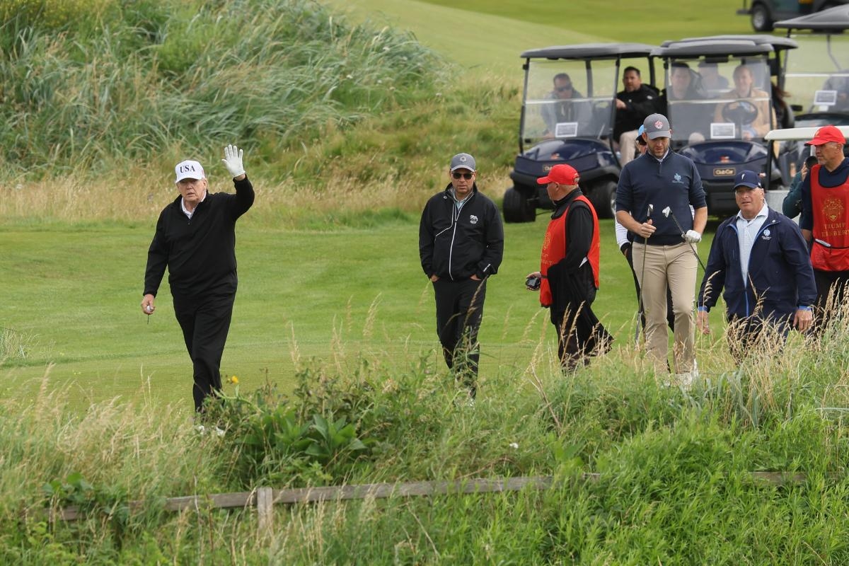 Donald Trump seen golfing at start of five day private visit to Scotland