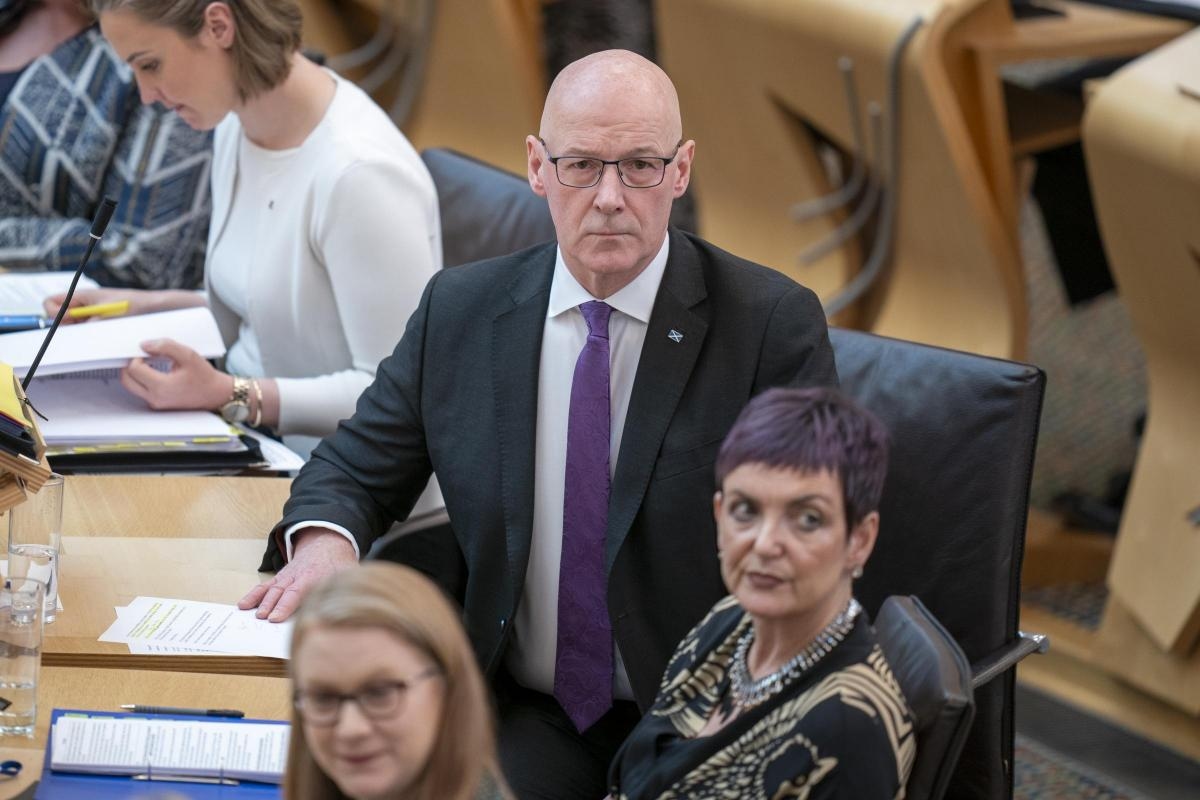 Swinney defends Gray Japan trip as opposition quiz FM on record cancer delays