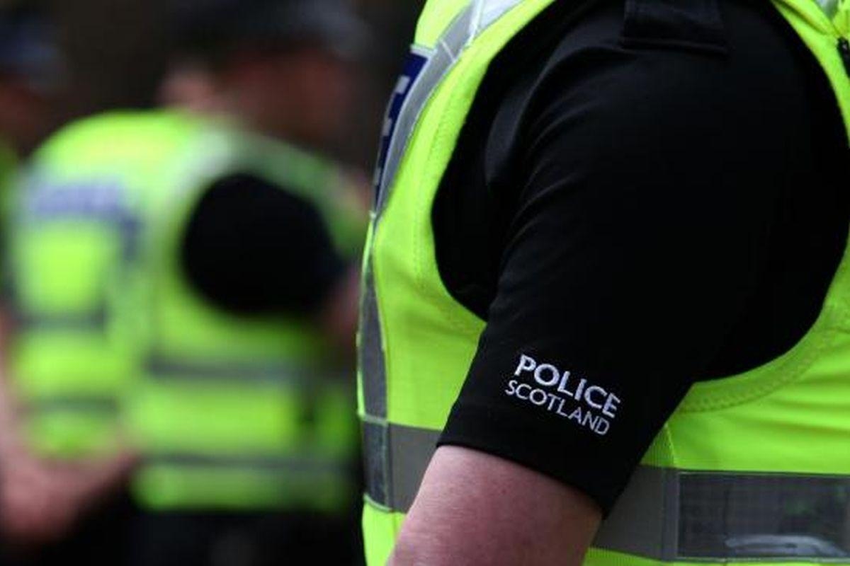 Probe after man found lying on road with serious injuries