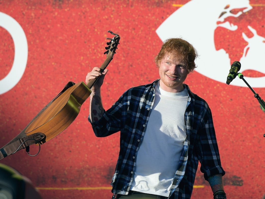 Ed Sheeran says he collects movie props — and would spend 6 figures to get George Clooney's Batman suit