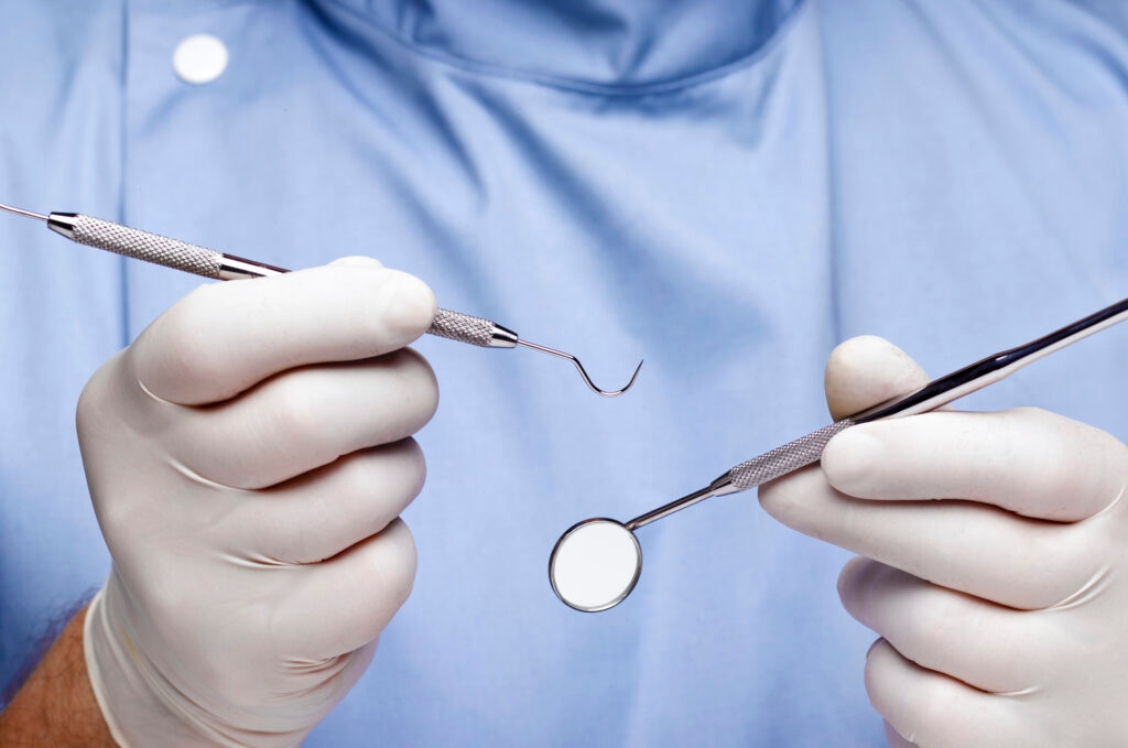After serving time on drug and weapons charges, Iowa dentist has license reinstated