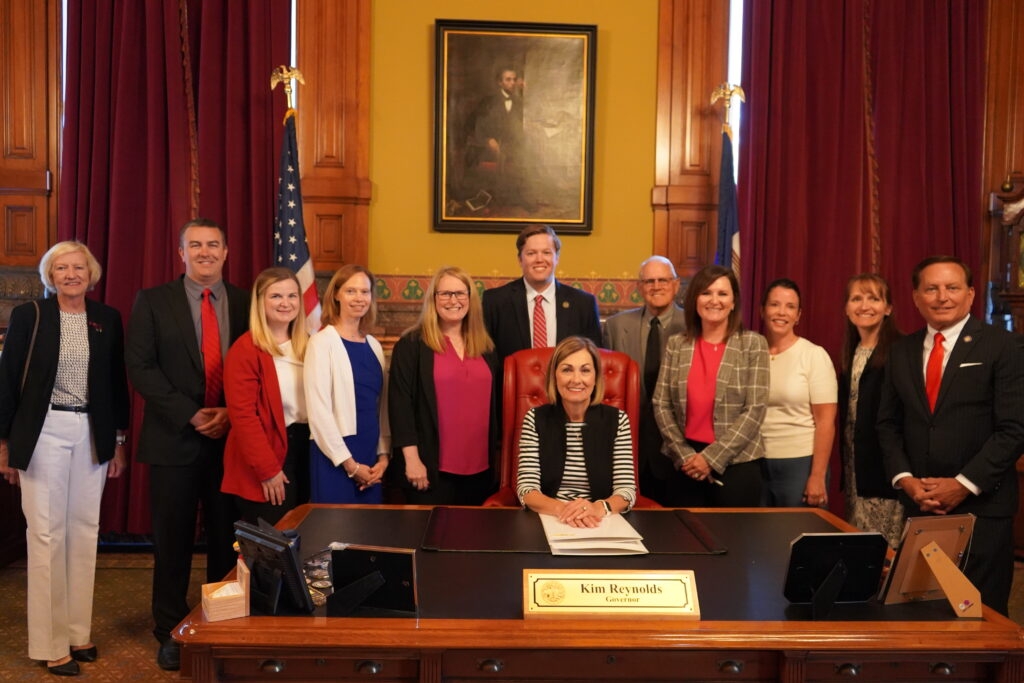 Gov. Kim Reynolds signs bills on election recounts, voter citizenship verification