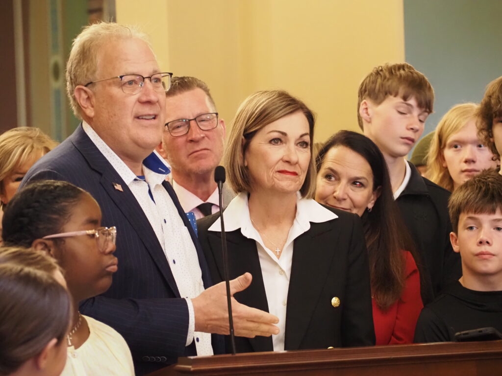 Gov. Kim Reynolds signs statewide ban on cellphones in class