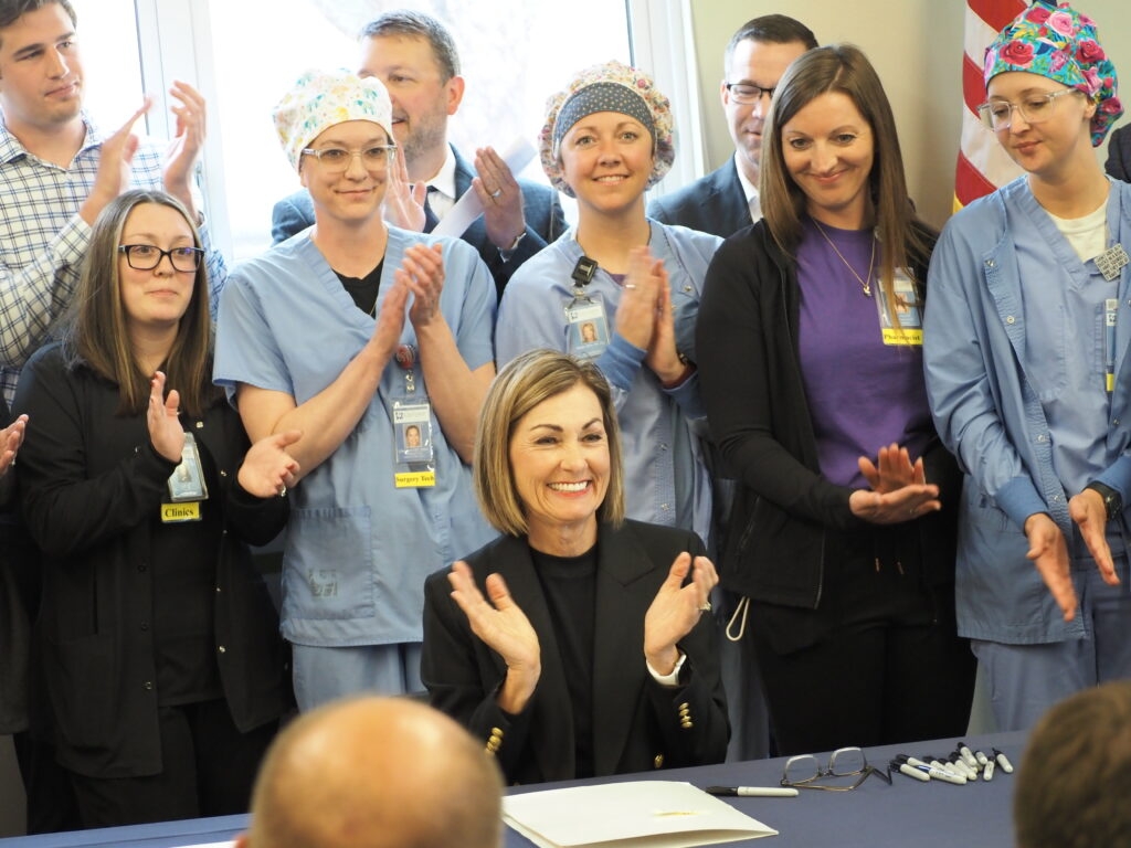 Gov. Kim Reynolds signs into law rural health care, medical residency expansion proposal
