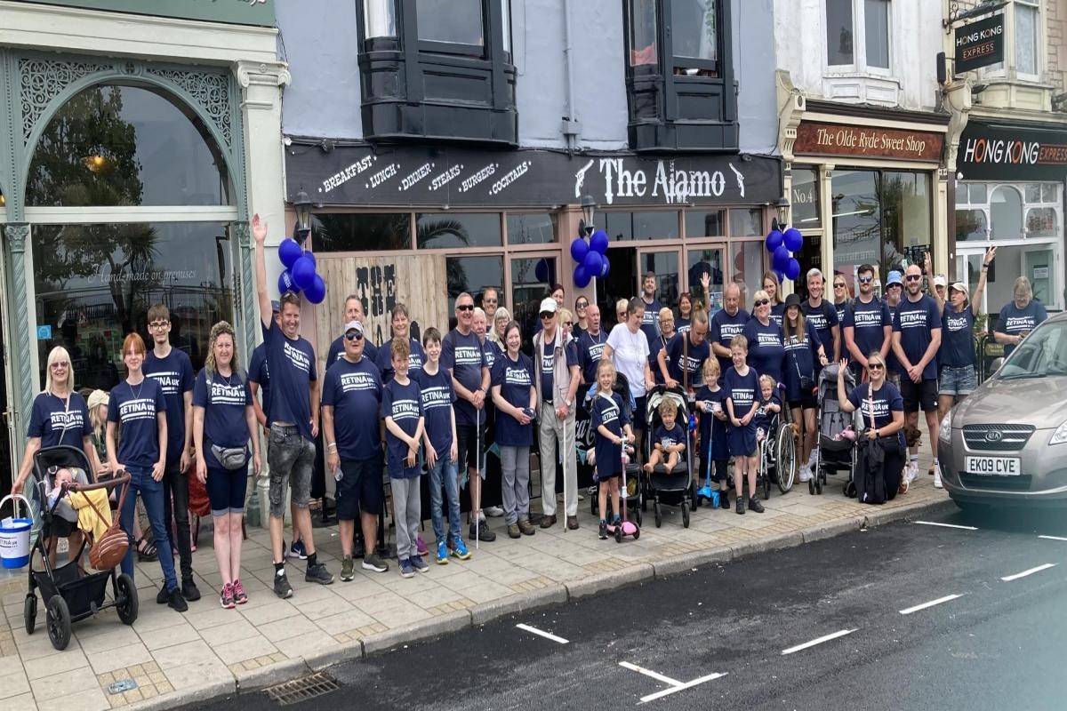 Walk with a white cane to raise money for charity