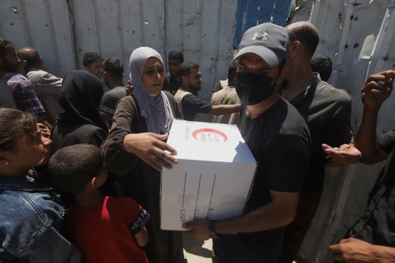 Swiss move to dissolve Gaza aid delivery group's Geneva branch