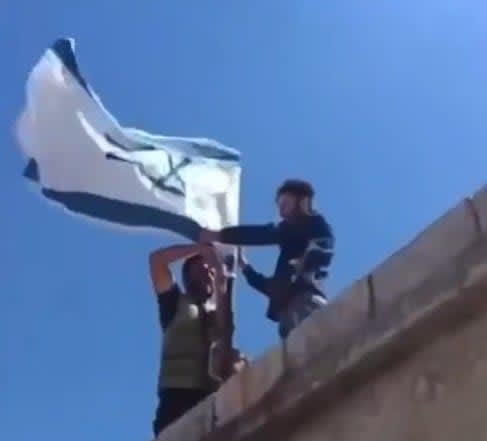 Syrian Druze protest waving Israeli flags, call for annexation by Israel