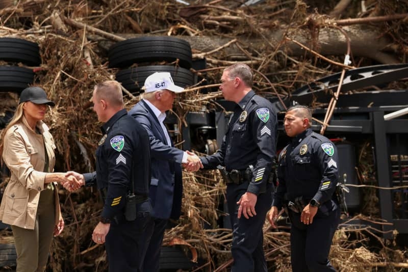 Trump arrives in Texas to survey flood damage as questions over response swirl