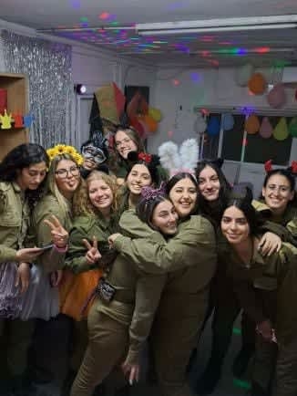 Former hostage Karina Ariev completes IDF service, five months after being freed from Gaza