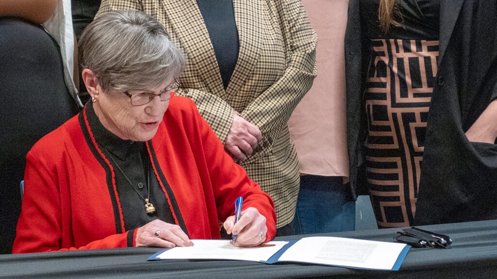 Gov. Laura Kelly signs budget bill, issues dozens of line-item vetoes, asks Legislature to try again