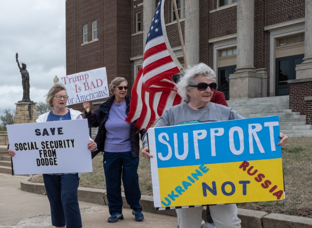 Way down yonder in southeast Kansas, demonstrators protest to vent frustration and find solace