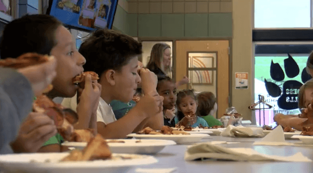 Sioux City students treated to wings and pizza thanks to art project