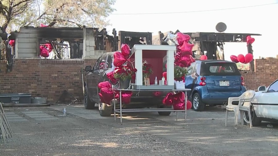 Family comes to pay respects to mother of 4 killed in house fire