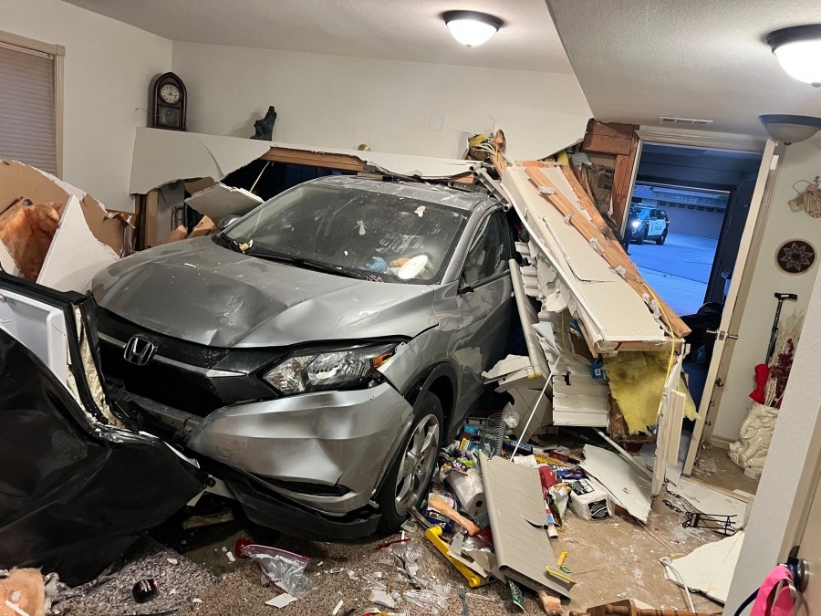 Photos: Car smashes into Lakewood house's living room