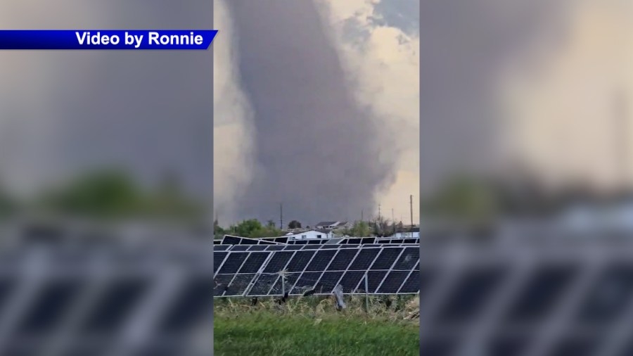 Residents survey the damage after tornado touches down in Bennett