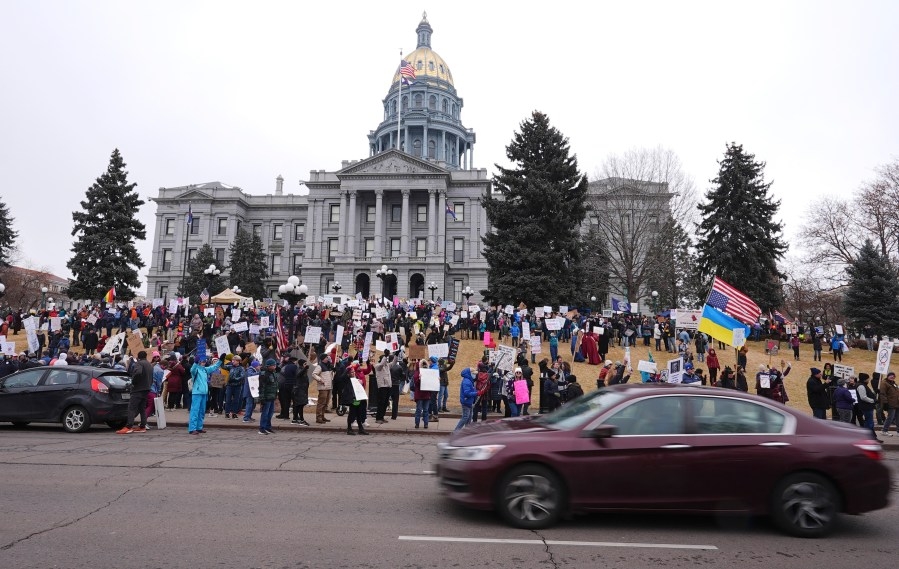 Protestors rally at Colorado Capitol against Trump's policies, Elon Musk