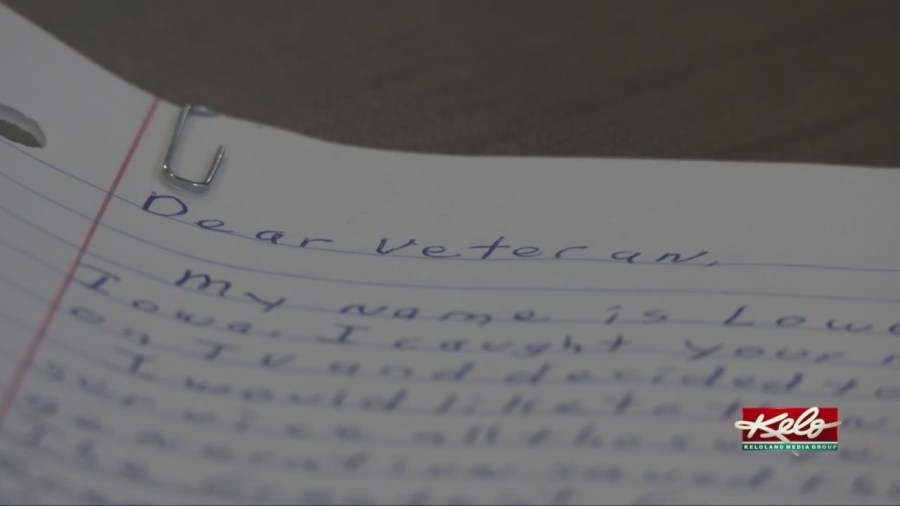 Honoring World War II vets with paper and a pen