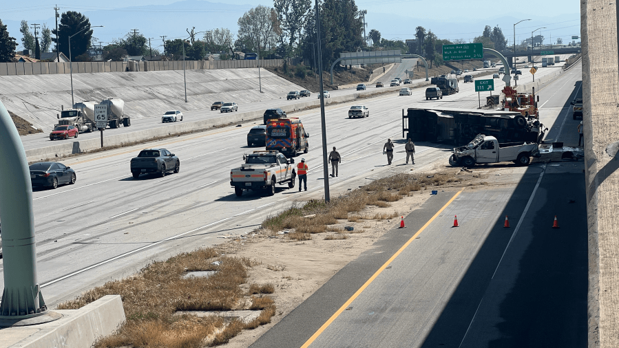 Semi truck rollover crash blocks transition road along Highway 58 near Chester Ave