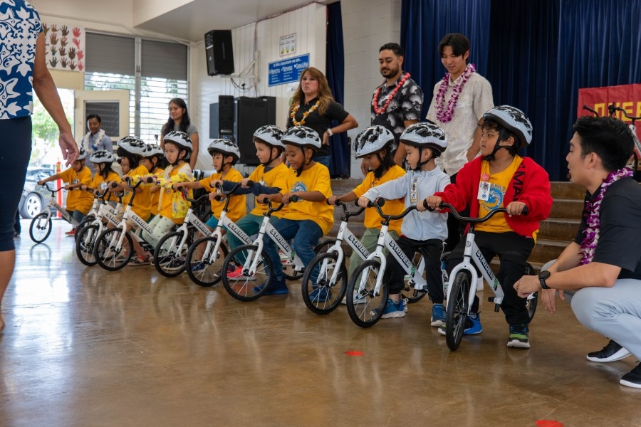 Kindergarten students receive donation of 24 bicycles