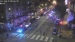 Three shot near Seattle's Pike Place, one critical