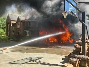 Firefighters tackle two-alarm fire at Issaquah home, no injuries reported