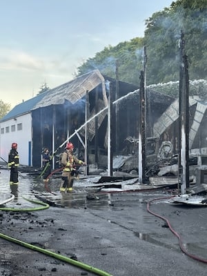 Over 60 firefighters respond to fire at Everett storage facility