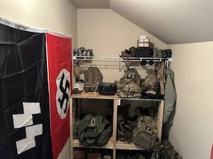Deputies execute search warrant on ‘Nazi white nationalists' in Lacey; stolen military gear found