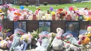 One week later: Manhunt for accused triple-murderer Travis Decker continues; a community grieves