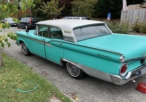 Two men arrested after stealing classic car in South Seattle
