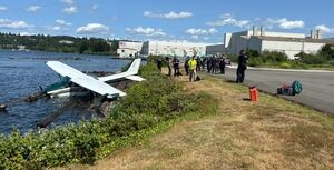 Small plane skids off runway and into Lake Washington