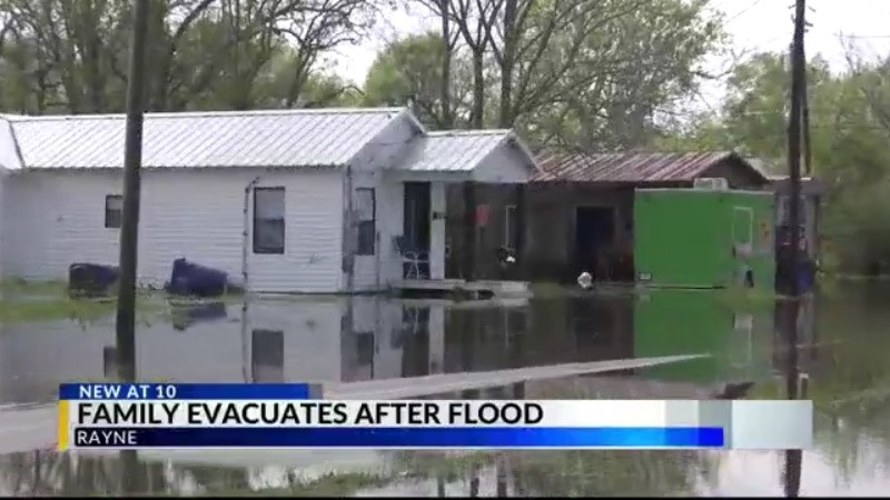Rayne family reacts after being evacuated from their home due to flash flooding
