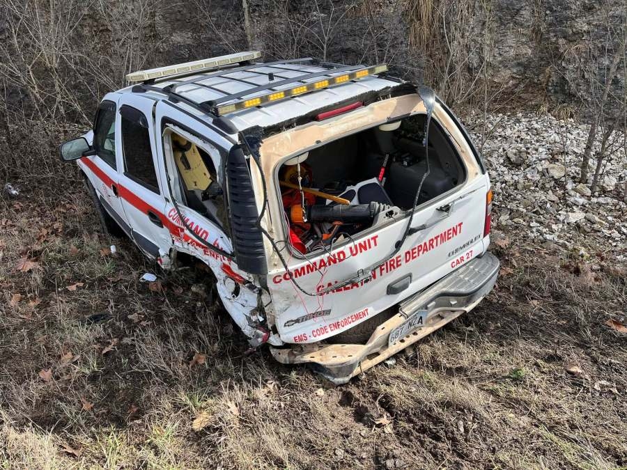 Vehicle hits fire department vehicle at scene of accident in Benton County, injures two