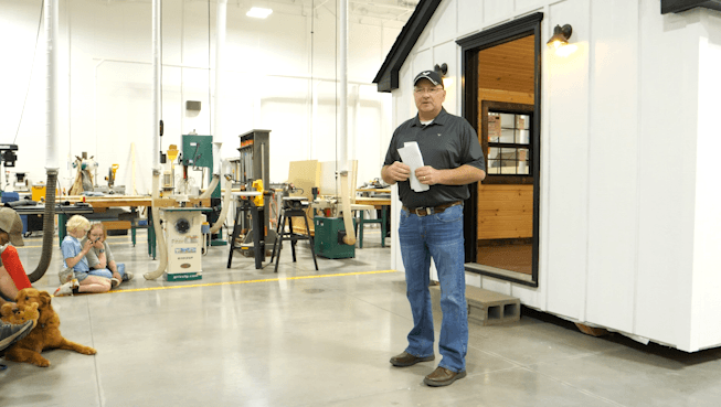 Rogers School District auctions tiny house made by students; money to be reinvested in the program