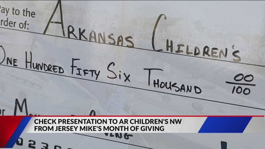 Check presentation: Fundraiser for Arkansas Children's exceeds goal