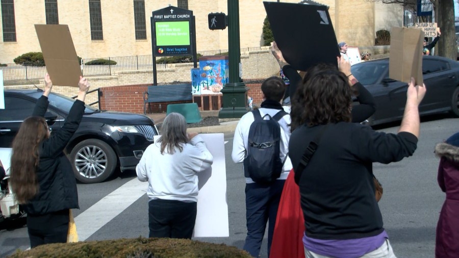Protesters take to Fayetteville streets over White House Executive Orders