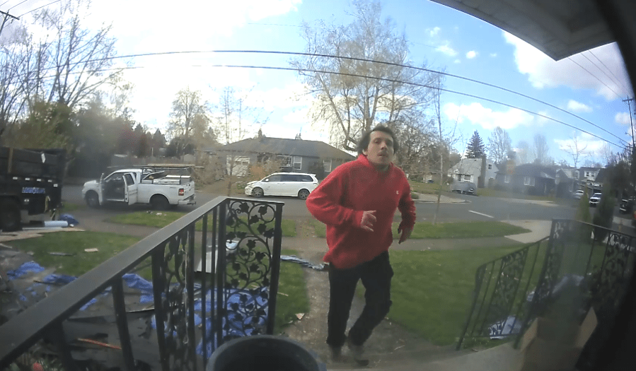 Man caught on camera yelling slurs, punching Portland homeowner facing assault charges, investigators say