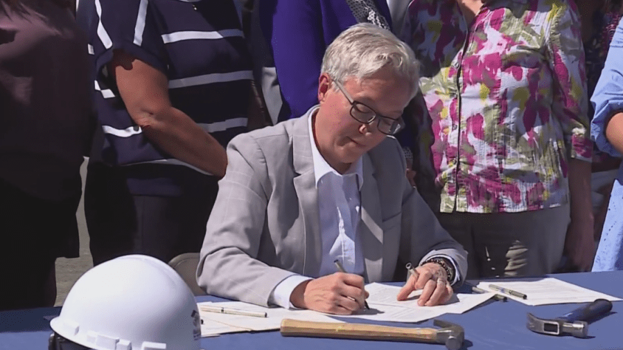 Kotek signs ‘middle housing' bills in Hillsboro ceremony