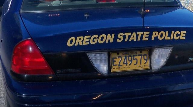 One dead, five hospitalized after two-car crash on Highway 26